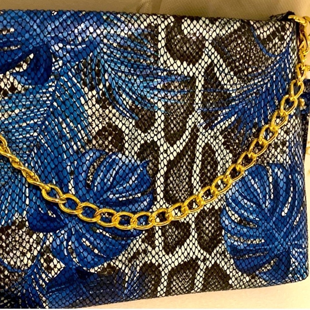 Sara Burglar Italian purse 
Genuine Leather Excellent Condition
Noemi Tropic - Picture 2 of 8